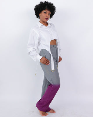black woman wearing cropped shirt and purple dip dyed pants